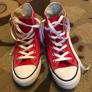 Red Converse high top shoes